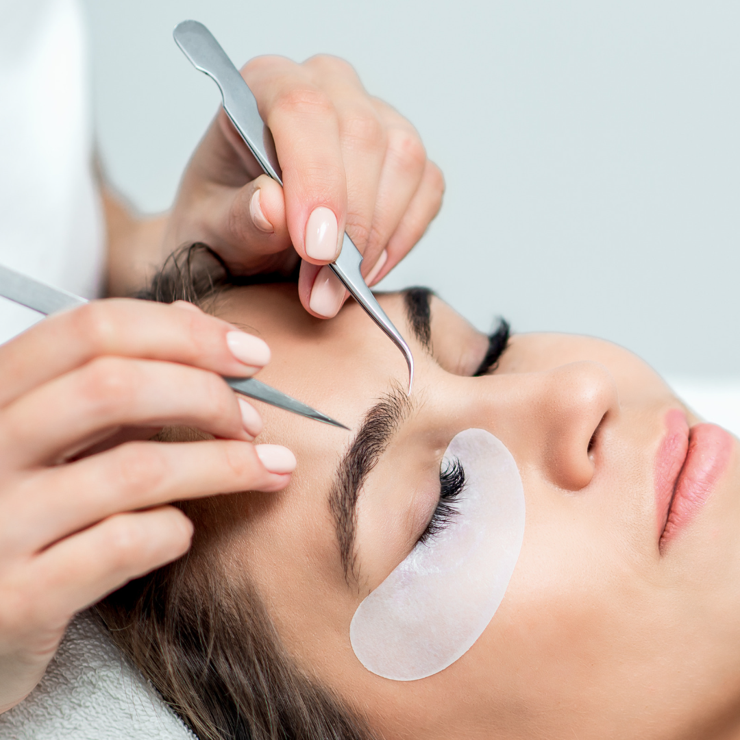woman with closed eyes with false eyelashes