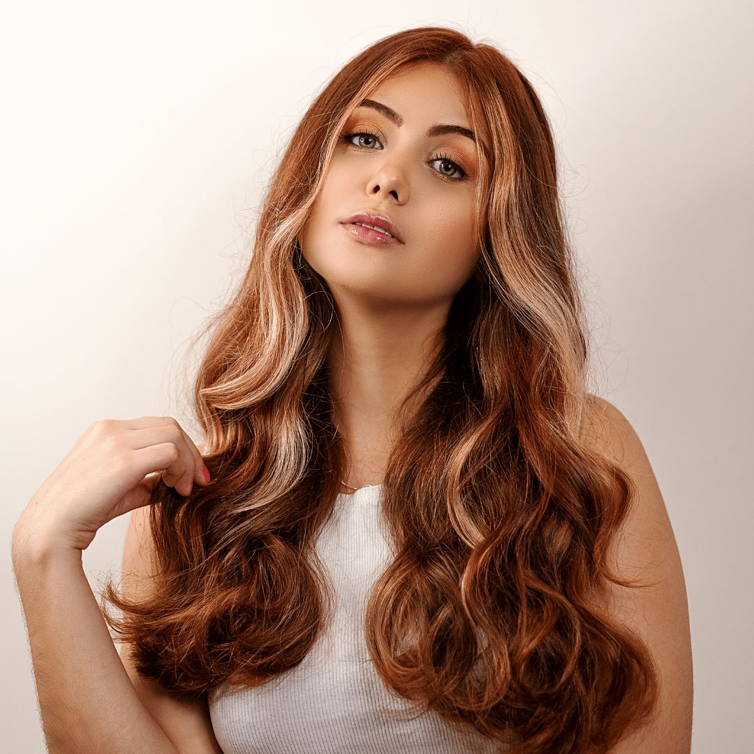 woman with copper-colored hair, redhead with hair extensions