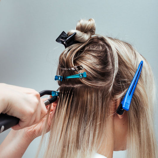 Blonde hair woman with hair extensions, hair extensions application, hair extensions application classes